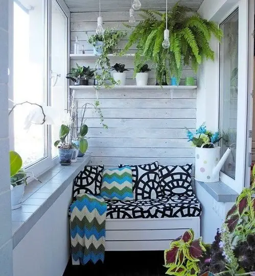 Pallet Wall with Integrated Bench in balcony