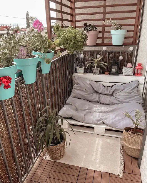 Balcony Furniture Ideas Pallet Bed on a Studio Balcony