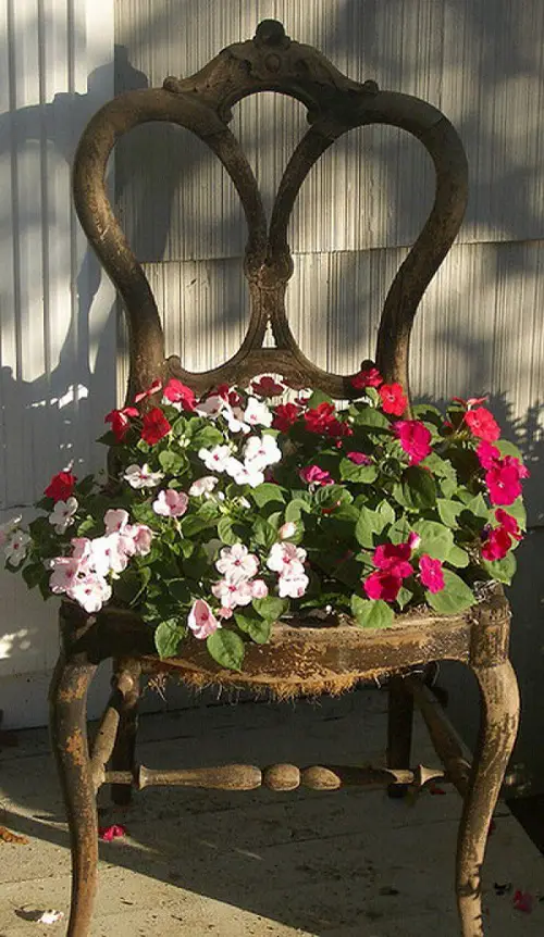 Salvaged Chair into a Beautiful Flower Planter