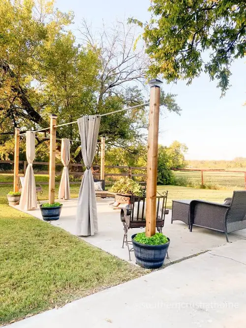 patio decoration with lamps and curtains