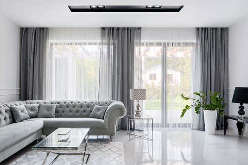 Matching Corner Plant in a Silver and White Living Room Decor