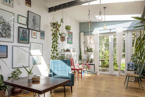 Studio with Plants Hanging From Ceiling
