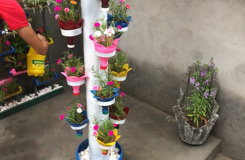 DIY Bottle Tower Garden Ideas 19
