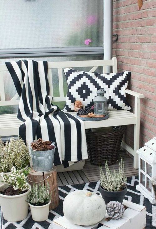 Fall Balcony Garden A Black and White Themed Balcony with Small Potted Plants