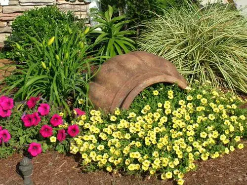 Broken Pot Spilling Flowers