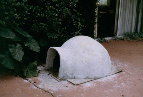 Wire Mesh & Concrete Dog House