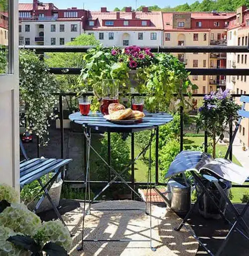 Cute Railing Planters by the Breakfast Table