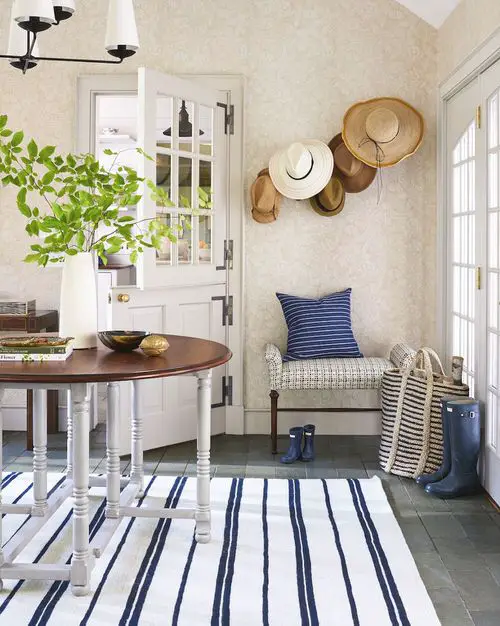 A Dutch Entrance with Potted Plant on a Table