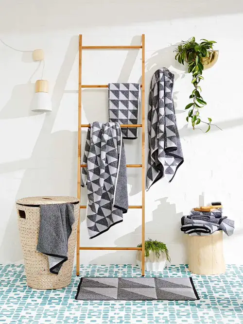 Tall Wooden Ladder with a Jute Laundry Basket
