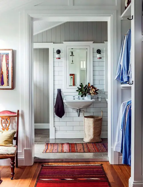 Colorful Rugs and a Potted Plant on Washbasin