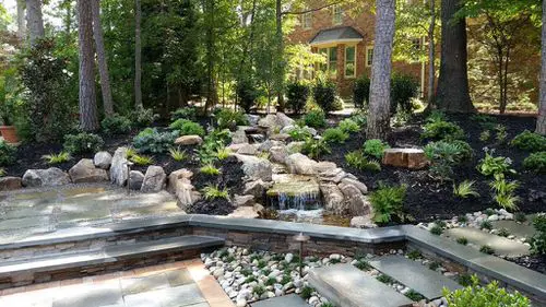 Rock Water Feature with a Sprawling Greenway