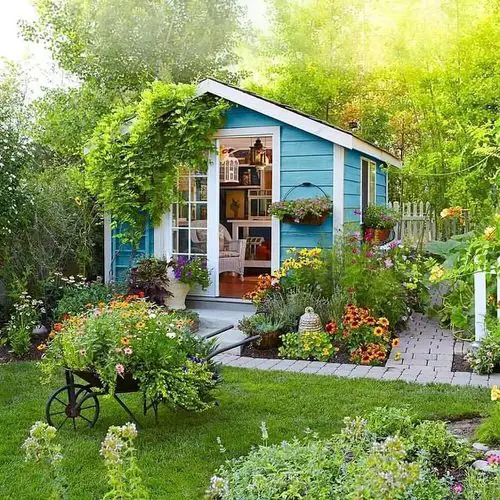 Tiny Cottage with a Floral Cart Garden in the Patio