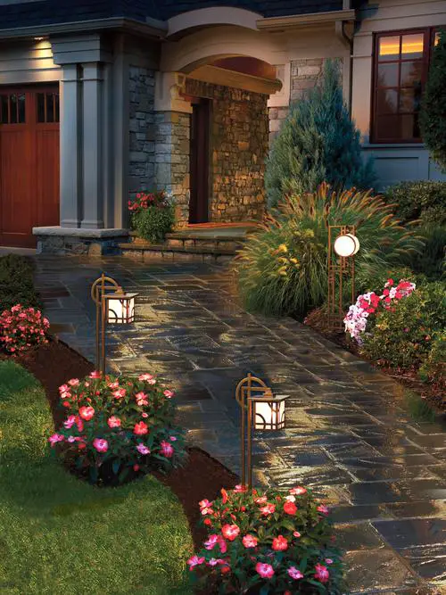 Small Lamps Over Lovely Blooms Along Pathway