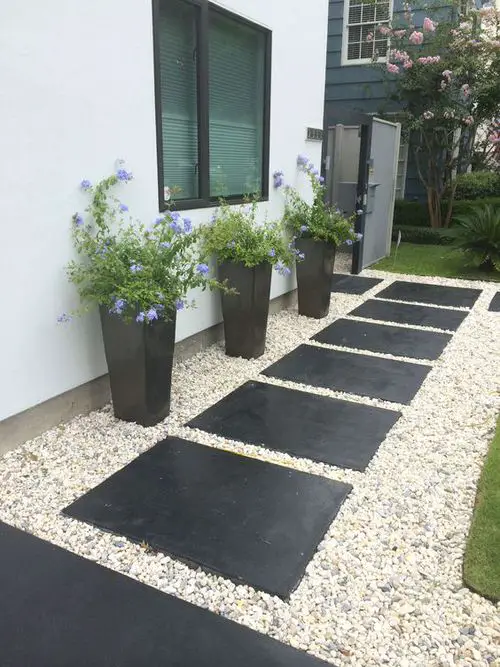 Front Yard Landscaping with a Line of Large Planters