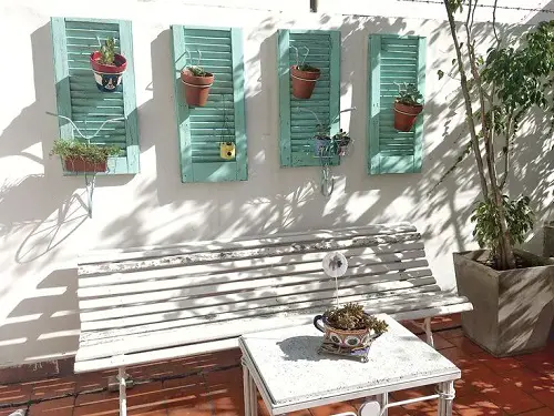 Recycle Old Shutters to Hang Flower Pots