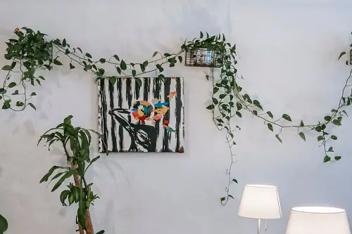 An Artist's Corner with Vining Pothos Around a Painting