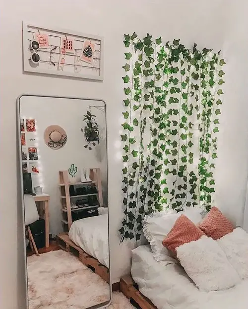 Hanging Ivy Decoration Beside a Life-Sized Mirror