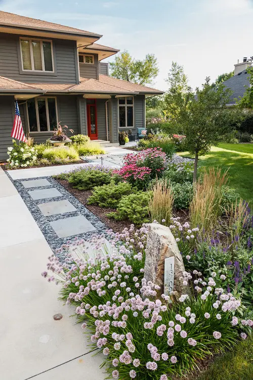 Blooming Groundcovers Along Paved Pathway