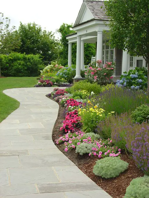 Pretty Blooms Bordering the Garden Path