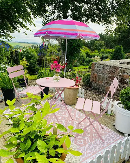 Vivid Parasol in a Pink Garden