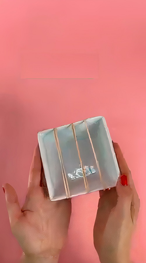 Take a Small Bowl or Cup and Wrap Rubberbands