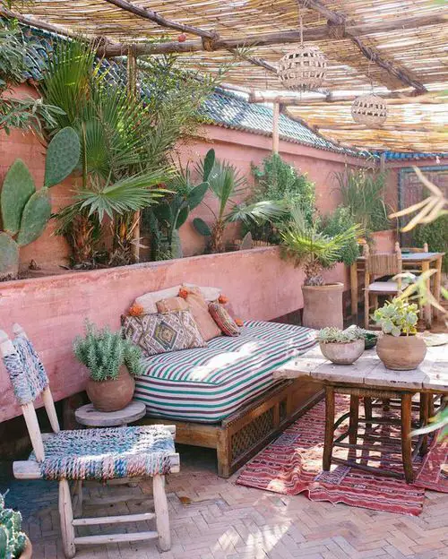 Cactus and Palm Lining along the Thatched Porch