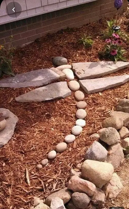 Butterfly Rock Feature on Shredded Wood Mulching