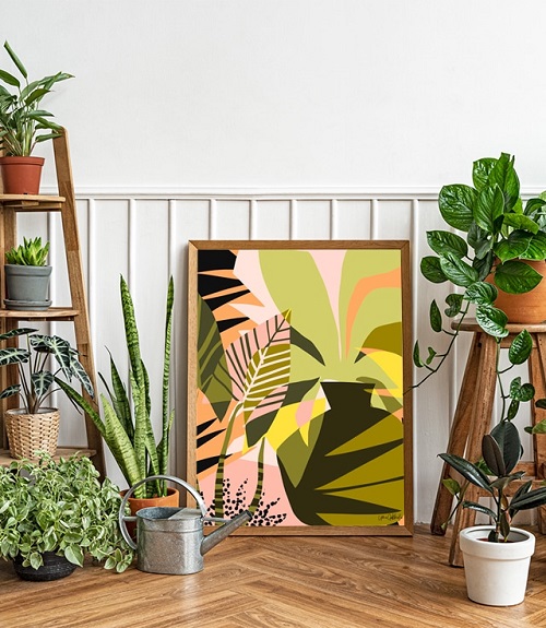 A Large Leaf Drawing Surrounded with Different Houseplants