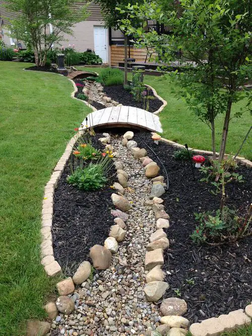 Dry River Gravel Bed  Running Below a Pallet Bridge