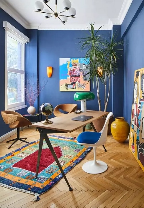 A Royal Blue Room with a Tall Green Specimen