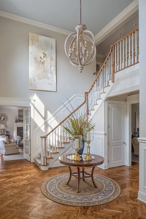 White Oak Staircase, Wall Painting, and an Exquisite Chandelier