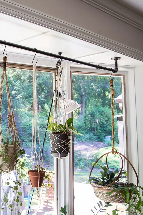 Macrame Planters Hanging From Industrial Pipe