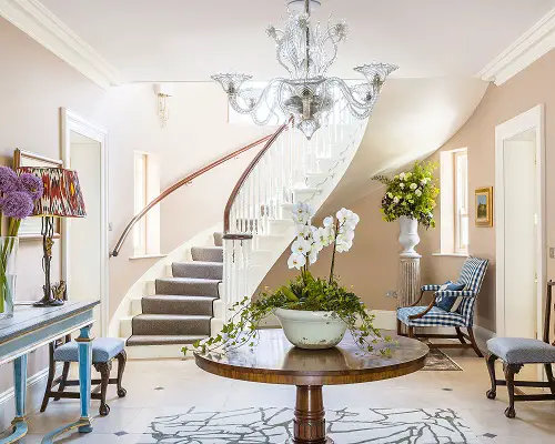 Elite Foyer Decor with Gorgeous Orchids in the Center