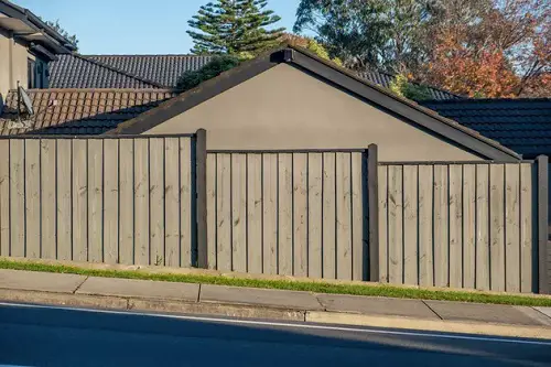 Wooden Panel with Metal Fencing Privacy Fence