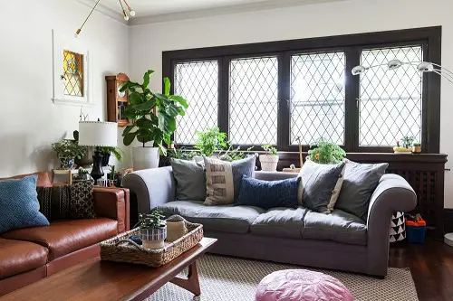 White Planters Near the couch Window
