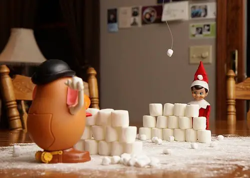 Elf Snowball Fight with Mr. Potato Head