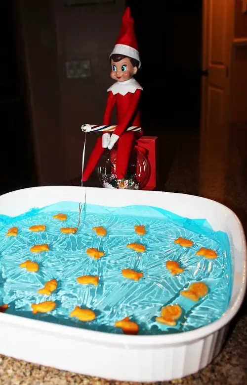 Elf on the Shelf Fishing with a Candy Stick