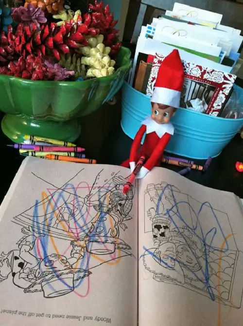 Elf on the Shelf Scribbling in Drawing Books