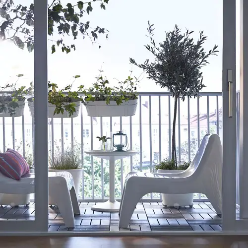 Stubby White Chairs and a Small Round Table