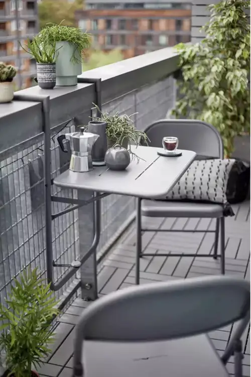 Grey Metal Chairs and Hanging Table in balcony 