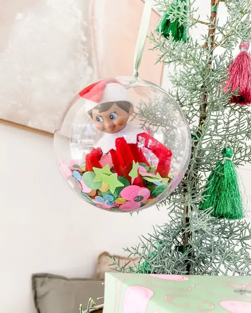 Elf in a Glass Globe