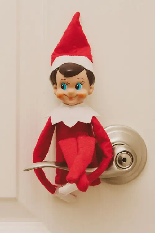 DIY Elf on the Shelf Ideas Elf on Door Handles