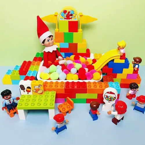 Elf on the Shelf with a Lego Playhouse