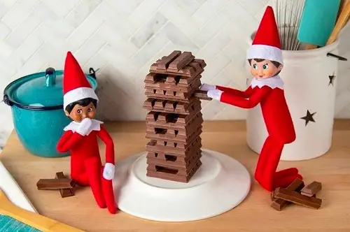 Elf on the Shelf with a Chocolate Tower