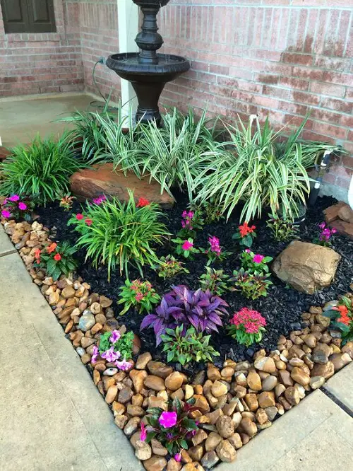 Flowerbed with Gravel and Stones in front of house