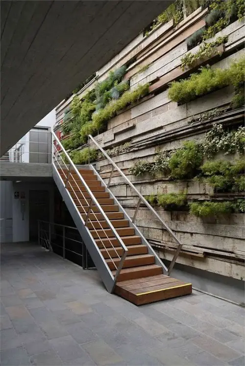 staircase A Wall Full of Vertical Planters