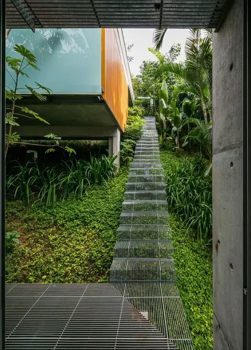 A Staircase over a Large Flower Bed