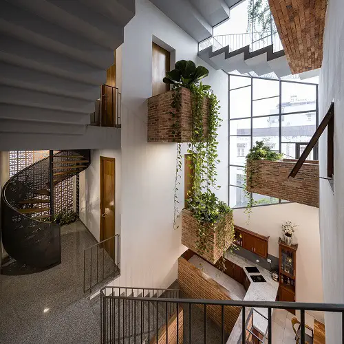 Large Planters in Indoor Balcony with Hanging Vines