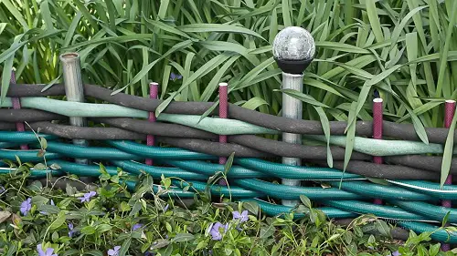 Water Hoses and Metal Poles edge