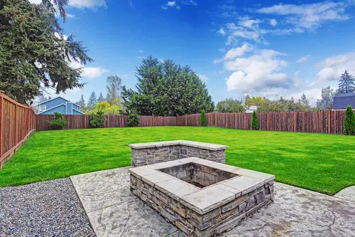 Backyard Flagstone Patio with Square Fire Pit